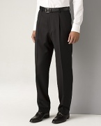 BOSS Black Dr. Hook Trousers. Single reverse pleated pants in virgin wool with rayon viscose lining to knee and unfinished hem. Inner button, hook and button tab closure. Side trouser pockets. Back buttoned welt pockets. 11.5 front rise. 17.5 leg opening.