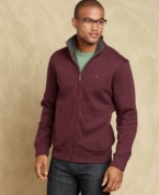 Casual can still be classy with this handsome and comfortable sweater from Tommy Hilfiger.