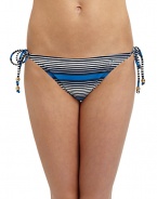 THE LOOKMultistripe printElastic waist and leg openingsLogo-embossed button at one sideSide tiesTHE MATERIAL80% nylon/20% spandexFully linedCARE & ORIGINHand washImportedPlease note: Bikini top sold separately. 