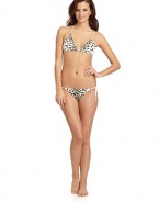 THE LOOKAllover leopard print with golden sequinsHalter straps tie at neckAdjustable padded triangle cupsBack tie closure with bead accentsTHE MATERIAL87% nylon/13% spandexFully linedCARE & ORIGINHand washImportedPlease note: Bikini bottom sold separately. 