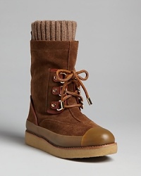 So cozy: Tory Burch brings style into adorable weekend standbys, boots with scrunchy sock linings and cute rubber cap toes.