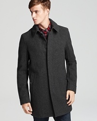 Top your winter looks with this sleek single-breasted wool coat from Burberry Brit.