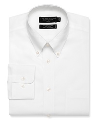 Long sleeve dress shirt with point, button down collar. Single needle tailoring, angle cut barrel cuffs with two buttons to resize width. Chest pocket. Textured solid white.