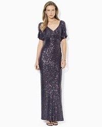 In sparkling allover sequins, Lauren Ralph Lauren's brilliant gown lends an opulent look for evening.