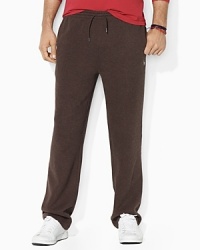 A classic-fitting drawstring pant in soft ribbed cotton is designed for casual comfort and style.