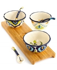 Set an everyday table that's always exciting with Bocca Geo condiment bowls, featuring bold patterns and vivid colors in hard-wearing earthenware from Tabletops Unlimited. Coordinating spoons and a bamboo tray complete the set.