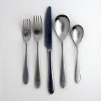 Designed by Robert Welch for Cambridge, this set includes eight each: dinner fork, dinner spoon, salad fork, teaspoon and dinner knife. Also includes one sugar shell, one butter knife, one serving spoon, one slotted spoon and one cold meat fork.