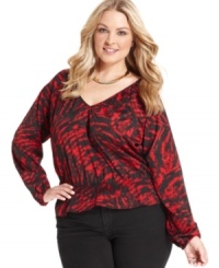 A cinched waist lends a slim silhouette to MICHAEL Michael Kors' printed plus size top-- pair it with your favorite neutral bottoms.