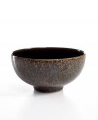 More than meets the eye, Denby's Praline rice bowl boasts standout durability in addition to style. With a distinct silhouette in casual stoneware and unique speckled glaze.