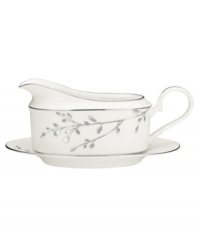 Birch branches grow around this pure white porcelain gravy boat and tray, turning formal tables into serene landscapes. A contemporary design refined in polished platinum with a breezy, all-natural beauty. From Noritake's collection of serveware and serving dishes.