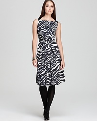 Send your style on an exotic quest in a pleated Jones New York Collection dress enlivened by a wild rush of zebra print.