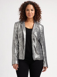 Allover sequins add stunning appeal to this fashion staple. Dress this glamorous blazer down with your dark-denim jeans.Notched collarLong sleevesFront pocketsBack princess seamsAbout 23 from shoulder to hemPolyesterDry cleanImported