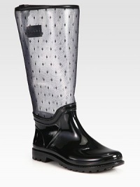 Scattered woven polka dots lend whimsical style to this rainy weather essential with leather trim. Rubber heel, 1 (25mm)Shaft, 13¼Leg circumference, 14½PVC upper with leather trim upper and point d'esprit panelingRubber liningRubber trek solePadded insoleMade in Italy