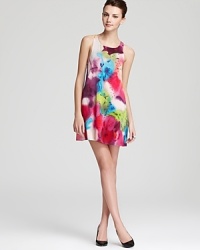 A fluid watercolor floral print wows on this Alice + Olivia dress, complete with a sleek racerback and relaxed silhouette.