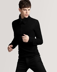 Another essential layering piece from Burberry, this luxurious cashmere sweater borrows a sportier look with its lay-down collar and zip placket.