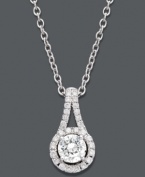 Indulge in a glamorous extra touch. This stunning teardrop-shaped pendant is decorated with sparkling, round-cut diamonds (1/3 ct. t.w.) set in 14k white gold. Approximate length: 18 inches. Approximate drop: 1/2 inch.