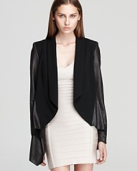 Leather and silk make a luxe pairing on Jay Godfrey's mixed media jacket, exuding a laid-back look in a draped silhouette.