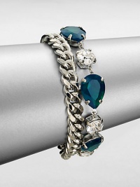 From the Black Tie Optional Collection. A chunky curb chain is joined by a row of emerald green and clear faceted stones in this fun design, the two strands creating a quirky complement to one another.Glass and plasticSilvertoneLength, about 8Ring claspImported