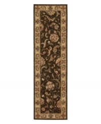 A graceful achievement in symmetry and style, this splendid area rug exemplifies the fine detail and precision handcraftsmanship of the Nourison 2000 collection. Featuring a myriad of delicate vinery and exquisite blossom medallions, this stylish piece lends warm color and perfection softness to any room in your home.