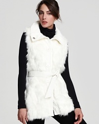 Bring a plush finish to your fall looks with this chic faux fur Via Spiga vest with cable knit accents.