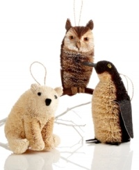 Bring a bit of arctic cool to your tree with too-cute animal Christmas ornaments, crafted of natural buri. Featuring a polar bear, owl and penguin, all from Martha Stewart Collection.