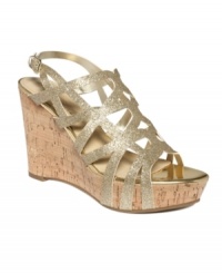 The Crank wedge sandals by Marc Fisher are perfect for a workday or snazzy evening out. The cork wedge heel adds height to this completely chic shoe.