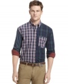 Mix-and-match plaid adds punch to a classic design with this tartan shirt from Izod.