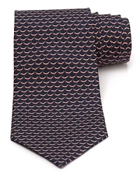 A silk tie adds distinction and flair to your formal presentation. With a repeating pattern of hot peppers, you'll also punch up your attire with a bit of wit.