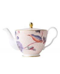 Delight in the tradition of English tea with the Cuckoo teapot, featuring Wedgwood bone china adorned with twinkling gold, fanciful birds and vintage blooms. With scalloped detail.