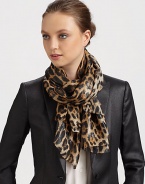 A wildly fashionable leopard print and metallic signature adds unmistakable style to a silk blend scarf.70% silk/30% nylonAbout 70 X 180Dry cleanMade in Italy