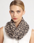 An endless design crafted of luxurious cashmere with a fierce animal print. Cashmere12 X 26½ loopDry cleanImported