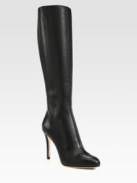 Rich pebble-grain leather forms this tall silhouette resting on a sky-high heel. Self-covered heel, 4 (100mm)Shaft, 16Leg circumference, 13½Leather upperBack zipLeather lining and solePadded insoleMade in Italy