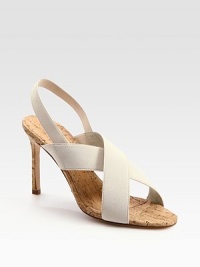 Comfortable elastic straps criss-cross the foot, concluding with a skinny, natural cork heel. Cork-covered heel, 3½ (90mm)Elastic upperLeather liningBuffed leather solePadded insoleMade in ItalyOUR FIT MODEL RECOMMENDS ordering one half size up as this style runs small. 