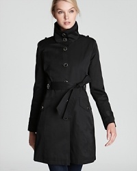 Forgoing belt loops for a woven design, this unique Via Spiga trench coat is a modern choice for the season. Featuring marbled buttons with silver hardware, military-inspired epaulets and a stand collar, it moves from day to evening in of-the-moment style.