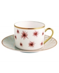 An intricate gold lattice pattern embellishes the edge of this striking after-dinner saucer from Bernardaud.