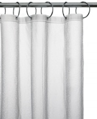 With a subtle embossed design, this water-repellent shower curtain liner from Charter Club features a weighted hem with suction cups to help keep the floor dry and metal grommets for durability.