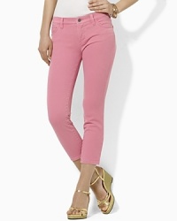 An essential cropped denim jean features a slim, straight leg and a hint of stretch for a versatile, modern look.