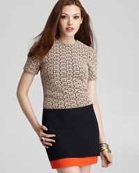 Impeccably tailored in delicate lace, this DIANE von FURSTENBERG top exudes feminine charm.