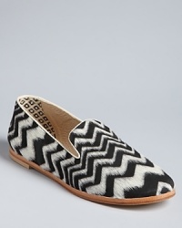 Designer Matt Bernson makes these smoking flats unforgettable in a zebra-inspired zig-zag print. The calf hair is trimmed in layers to show off the striping.