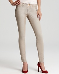 These True Religion skinny corduroy pants boast a faded effect for a fall-perfect vintage feel.