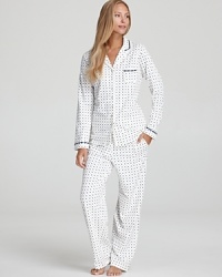 All-over polka dots lend a retro feel to this lace- and ribbon-accented pajama set from Eileen West.