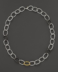 New developments in elegance. Links in hammered 24 Kt. yellow gold, dark and light silver immediately set Gurhan's hoopla necklace apart.