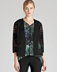 A stylishly-modern REISS cardigan offers a relaxed fit and luxe layering, plus is diverse enough to wear day or night. Its sheer stripes are endlessly chic over a printed top and on-trend for fall.