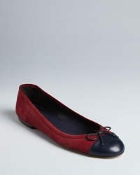 Pure elegance, these Delman ballet flats marry classic styling with stylish cap toe details.