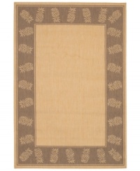 Retreat to the tropics with this casual rug, framed with an inviting design of pineapples in warm, cocoa-brown colorways. Couristan's durable polypropylene blend allows the rug to be placed nearly anywhere, indoors or out! Whether you add it to your patio or make a splash in your family room, this soft piece is pet-friendly and resistant to mold and mildew.