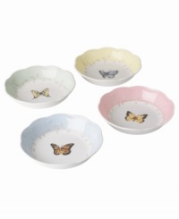 Discover a beautiful butterfly at the bottom of your fruit dish. Perfect for mixing and matching with Butterfly Meadow dinnerware, this whimsical set features four pretty pastels and a delicate vine design. With a gently scalloped rim.