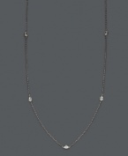 Add sparkle and shine by the inch. Trio by Effy Collection's stunning necklace features seven stations of round cut, bezel-set diamonds (5/8 ct. t.w.) strung from a delicate, 14k white gold chain. Approximate length: 24 inches.