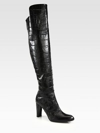 Draw attention with this luxe silhouette of crocodile-print leather, with a soaring heel and back zip closure. Self-covered heel, 3¾ (95mm)Shaft, 21½Leg circumference, 14Crocodile-print leather upper with back elastic panelBack zipLeather liningRubber solePadded insoleImported