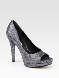 Shine on with this glittery peep toe design, resting on a platform and sky-high heel. Self-covered heel, 4¾ (120mm)Covered platform, 1 (25mm)Compares to a 3¾ heel (95mm)Glitter-coated fabric upperPeep toeLeather lining and solePadded insoleImportedOUR FIT MODEL RECOMMENDS ordering true size. 