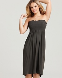 Smocked and strapless, Magicsuit's soft jersey coverup slips on for the walk from beach to bar.